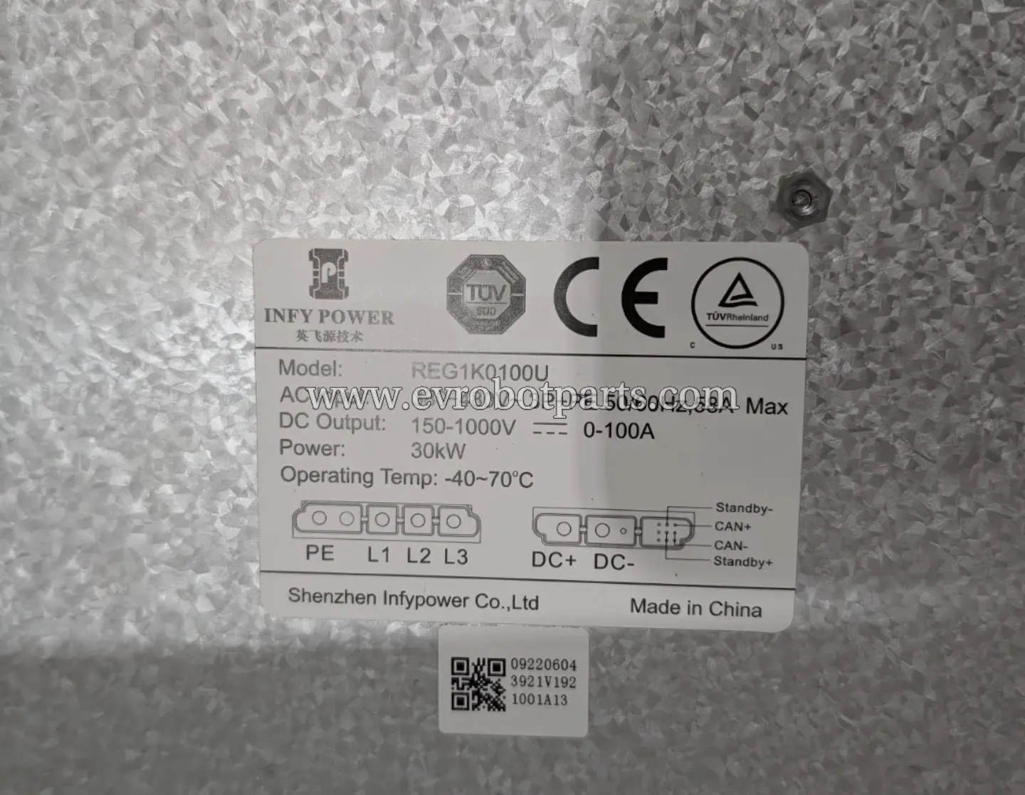 Label of the Infy Power REG1K0100U power supply unit, showing model, AC/DC input/output specifications, and certification marks